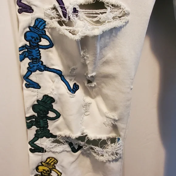 Colorful Embroidered Ripped Jeans - Picture 10 of 16